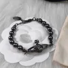 Designer Viviane Westwoods Vivienen Haute Version Western Empress Dowager Gun Noir Saturne Collier De Perles Bracelet Ensemble Cool Placage Noir Saturne Collier5556