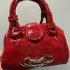 حقيبة حمل باليد المحمولة Viviane Westwood Mini Crossbody مصممة مصممة خمر نمط تمساح ورنيش جلود صغيرة الكتف حقيبة يد 240123