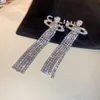 Diseñadora Viviane Westwoods Vivienen Empress Dowager Xis Nuevos aretes largos con borlas de Saturno y diamantes completos para mujeres con temperamento versátil y a la moda 2666+6