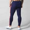 Pantalons pour hommes Pantalons de jogging maigres hommes pantalons de survêtement de course pantalons de survêtement en coton pantalons de sport de Fitness pour hommes bas d'entraînement de musculation T240126