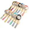 2024 Colorful Interlaced Letter Leather Tassel Bracelet Keychain Silicone Bead Bracelet Wooden Blank Keychain Disc