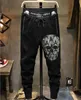 Herrbyxor Sommardesign Nytt modevarumärke Herrens avslappnade heta borrbyxor Slim Leggings Men's Scalded Skull Elastic Pants T240126