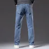 Plus size 40 42 44 outono masculino azul reto solto jeans negócios casual algodão estiramento denim calças masculinas marca 240124