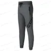 Pantalons hommes Automne Joggers pantalons hommes en cours d'exécution maigre coton pantalons de survêtement survêtement Gym Fitness entraînement Sport pantalon vêtements de Sport pour homme bas T240126