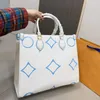 24SS Donna Retiro madeleine Totes Borse Borsa a mano con fiori in rilievo in pelle Luxurys Designer Shouder Crossbody Messenger Borsa da viaggio da donna Borsa a tracolla 36 cm