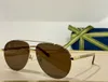 Óculos de sol para homens e mulheres designers 1098 moda popularidade ao ar livre praia estilo anti-ultravioleta uv400 placa de metal oval quadro completo retro óculos com caixa