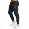 Męskie spodnie Męskie wysokiej jakości Sik Silk Marka poliestrowe spodnie Fitness Fitness Casual Spodery codzienne trening fitness swobodne sporty do joggingu t240126