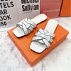 2023 Designer S Roland Ladies Sandals Sandaler Summer Flat Fashion 4 Color Slippers Beach Saint L Aur ENT Slippers New Designer tofflor för kvinnor Storlek 37-41