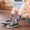 Women Socks Woman Street Hip Hop Creative Personality Söta ko fläckar europeisk och amerikansk stil mode kul i rör