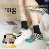 Calzini da donna a righe giapponesi in cotone casual Harajuku tubo centrale corto lavorato a maglia patchwork colore femminile