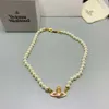 Designer Viviane Westwoods Vivienen Empress Dowager Xis Nouveau Coloré Étoile À Cinq Branches Saturne Collier De Perles Bracelet Femmes Lumière Luxe Mode Style 12225