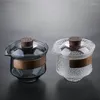 Bicchieri da vino che vendono un set da tè Kungfu con tazza di vetro resistente alle alte temperature dal design cinese ondulato