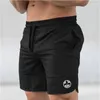 Shorts pour hommes Mode d'été Casual Respirant Bodybuilding Fitness Gym Sports Lettre imprimée Slim Fit Longueur du genou