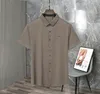 moda letni designerka kardigan koszulki koszulki męskie luksusowe romans komercyjny polo t-shirt tops polo liter haft t-shirt krótkie rękawowe koszulka