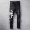 Mens Jeans kläddesigner amires Denim Pants 817 Black Amies High Street Letter Angel Pattern Casual Micro Elastic Cotton Youth Tight for Men Distresp