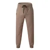 Pantalons pour hommes pantalons de survêtement décontractés avec poches pantalon de Jogging cordon de serrage en plein air course Fitness pantalon masculin respirant pantalons Ropa Hombre