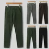 Pantaloni da uomo Pantaloni lunghi da uomo autunno inverno casual Sport di colore puro con tasca pantaloni a vita elastica moda Ropa Hombre