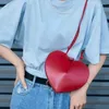 Sacos de noite Pêssego Coração Forma Luxo Designer Bolsas Para Mulheres 2024 Moda Bolsa Simples Versátil Senhora Pequeno Ombro Crossbody