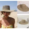 ワイドブリムハットインロー中空生まれた麦わら帽子ラフィア女性綿毛フラフラッピーサマーバケーションビーチパナマトップ