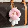 Fluffy Womens Designer Keychain Vivienne Luxury Keyring Fashion Bag Charm för män Klassiska nyckelkedjor Rostfritt stål Märke Keychains Fashion Accessories