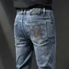 Sonbahar ve Tasarımcı Kış New Jeans Erkek Kalitesi İnce Uygun Küçük Ayaklar Uzun Pantolon Moda V5ez