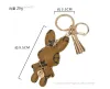 desigenr Jewelry Porte-clés de créateur en forme de lapin en cuir PU avec pendentif pour sac à main, porte-clés de voiture, charme, fleur marron, mini sac, pompon, cadeau pour homme et femme