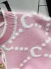 2024 g 브랜드 디자이너 여성 스웨터 핑크 옷 탑 가디건 캐주얼 V- 넥 니트 코트 긴 슬리브 니트웨어 편지 디자이너 흰색 겨울 스웨터
