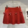 Jupes Collection hiver strass Bow laine courte Mini jupe plissée femmes