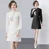 Casual Dresses Chines Style Retro Spring Beading Stand Collar Kort klänning 2024 Vintage Women Långärmad Phoenix Embroidery Party Mini
