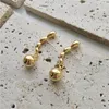 Brincos pendurados simples ins bolas douradas vintage designer elegante mulheres verão waterdrop clássico longo piercing