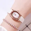 Womens oval advanced sense light luxury fashion diamond-set small dial belt waterproof quartz watch C4