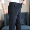 Abiti da uomo Taglie forti 44 42 40 Pantaloni da uomo d'affari sociali da uomo 2024 Pantaloni da sposa slim formali primaverili Pantaloni da uomo casual di moda di marca