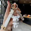 24Keychains Lanyards designer key chain luxury bag charm female cute bear key ring fashion fur ball pendant trendy accessories number plate creative exquisite good