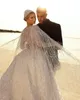 بذلة مذهلة فساتين زفاف متصلة مخصصة مصنوعة طويلة الأكمام طويلة الدانتيل ثوب الزفاف القابل للفصل