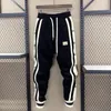 Mode coréenne imprimé Hip Hop taille élastique pantalon hommes Joggers Streetwear sarouel à revers cheville longueur pantalon hommes vêtements 240124