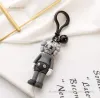 Desigenr joyería Diseñador de lujo Alta calidad Sílice Ge Llavero Fiesta Dibujos animados Cráneo Favor Colgante Coche Mochila Llavero Bolsa Encanto Hebilla de metal Regalo de joyería