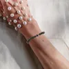 Braccialetti con ciondoli Bracciale da uomo con perline incrociate Catena da polso Pietra maschile per donne La preghiera decorativa con perline naturali