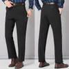 Zima mężczyzn Keep Warm Suit Pants Nie żelazne spodnie Mężczyźni Czarne spodnie polarowe Slim-Fit Prosty biznesowy kombinezon Formal Moders 240125