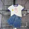 Nuove tute firmate T-shirt per bambini Taglia 100-160 Design di giunture baby Manica corta e pantaloncini in denim con logo ricamato Jan20