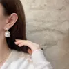 Boucles d'oreilles Style de mode Boucles d'oreilles pendantes en perles Bijoux de boutique pour femmes Boucles d'oreilles à la mode avec cadeau d'amour avec boîte Nouveau cadeau de charme Boucles d'oreilles avec logo classique