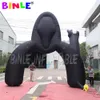 wholesale Advertising Inflatables holiday event giant black scary skull ghost arch inflatable archway halloween with air blower for yard party decoration