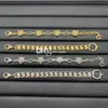 Goldene Geistesketten-Armbänder, Designer-Buchstaben-plattierte Ketten, Kupfer-Gold-Kettenarmbänder für Männer und Frauen, mit Geschenkbox-Sets, Geburtstag, Jahrestagsgeschenk