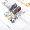 Desigenr smycken Flower Design Metal Car Keychain Bag Pendant Charm smycken Flower Key Ring Holder For Women Men Fashion Pu Leather Animal Key Chain Accessories 7vp0
