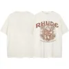 Rhude Tshirt Designer Original Qualité T-shirts pour hommes Distinguer le marché Devise Lettre Affiche Nouveau Couple Lâche Manches Courtes Tendance