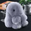 14 cm Söt pluffan Bunny KeyChain Rex äkta kaninpäls Key Chains For Women Bag Toys Doll Fluffy Pom Pom Lovely Pompom Keyring241u