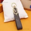 desigenr bijoux Nouveau Designer Couple Porte-clés Unisexe Clé Boucle Sac De Voiture Pendentif Lettre Téléphone Mobile Pendentifs Hommes Femmes En Cuir Porte-clés