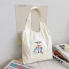 Kvällspåsar 2024 Kvinnor Canvas axelväska Student Tote Fashion Mushroom Print Handbag Korean version stor kapacitet shoppingväst