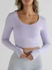 T-shirts pour femmes T-shirts courts à manches longues Coupe ajustée Col rond Couleur unie Chemise courte Hauts avec trou pour le pouce Pour le printemps Automne Quotidien