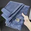 Jeans Designer Herren Sommer dünn vielseitiger China-Chic-gedruckter Modemarke Elastizität Slim Fit Small Füße gerade Beinhosen für