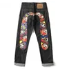 Jeans de rue européens et américains Hip Hop Graffiti Print Jeans marque à la mode pour hommes Slim pantalon droit à jambes larges 240122